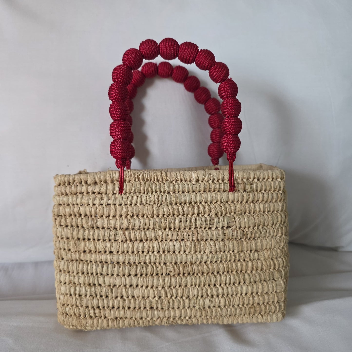 Bolso artesanal de rafia y algodón bambal