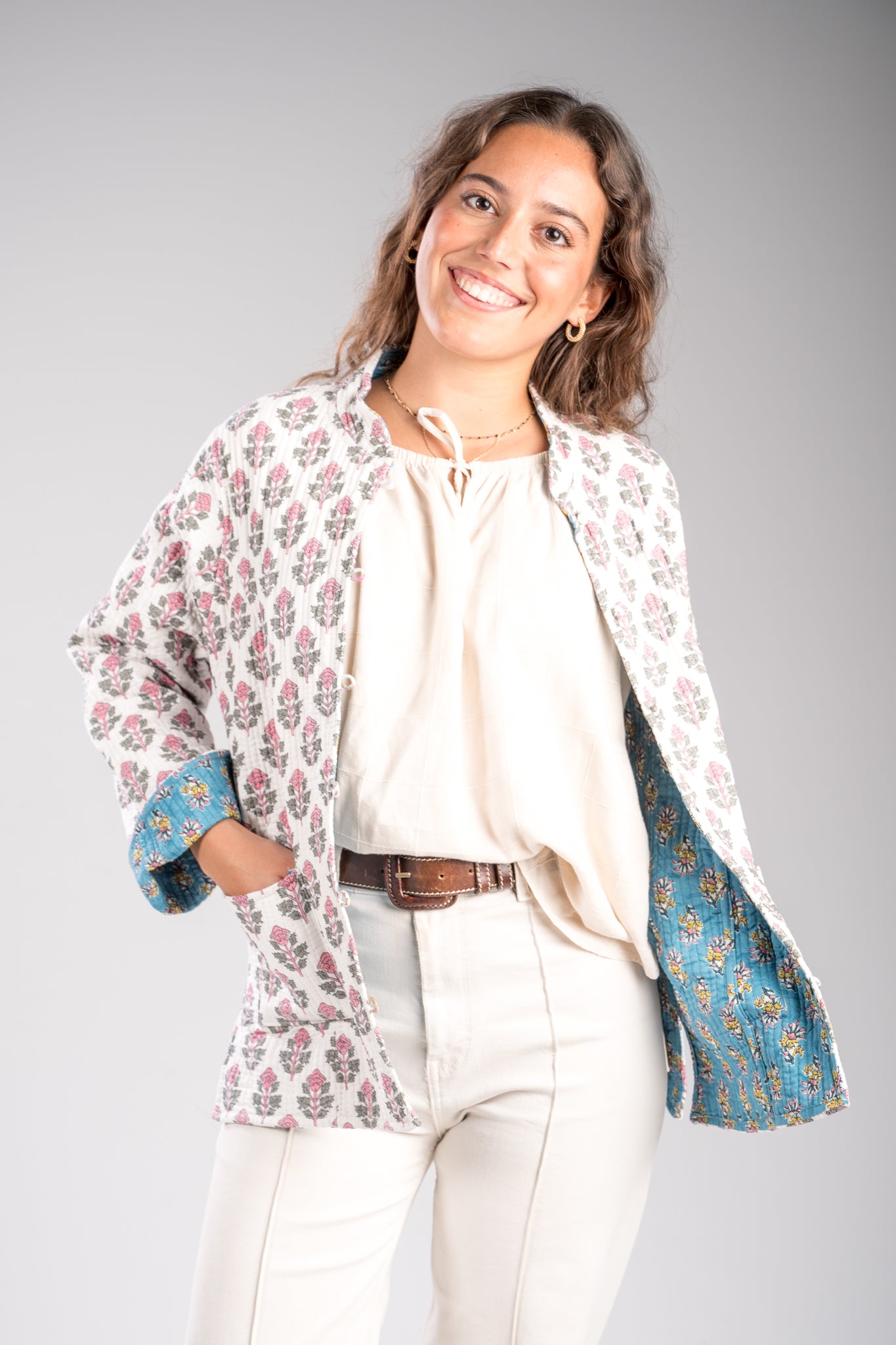 Chaqueta reversible blanca-turquesa