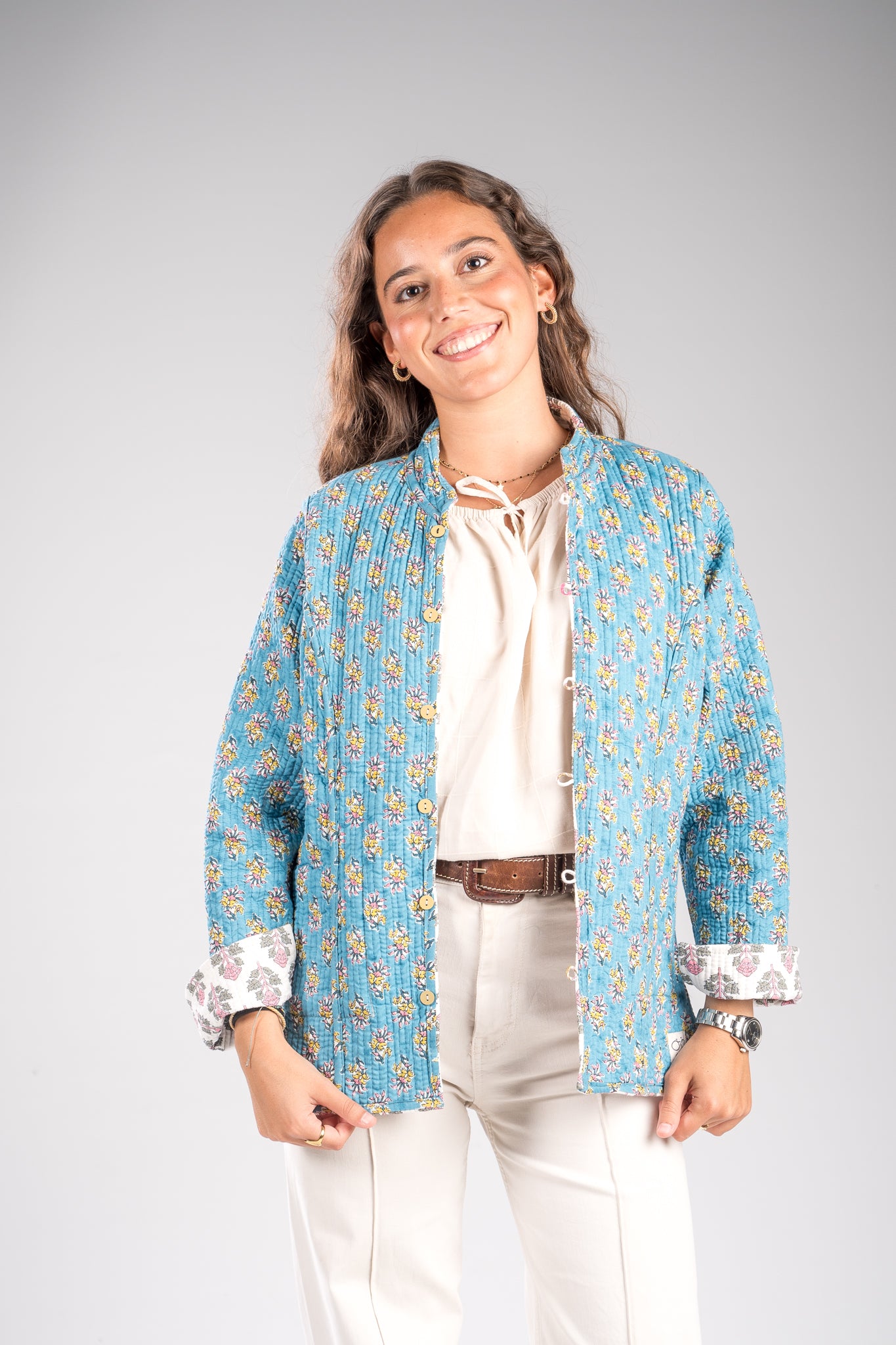 Chaqueta reversible blanca-turquesa