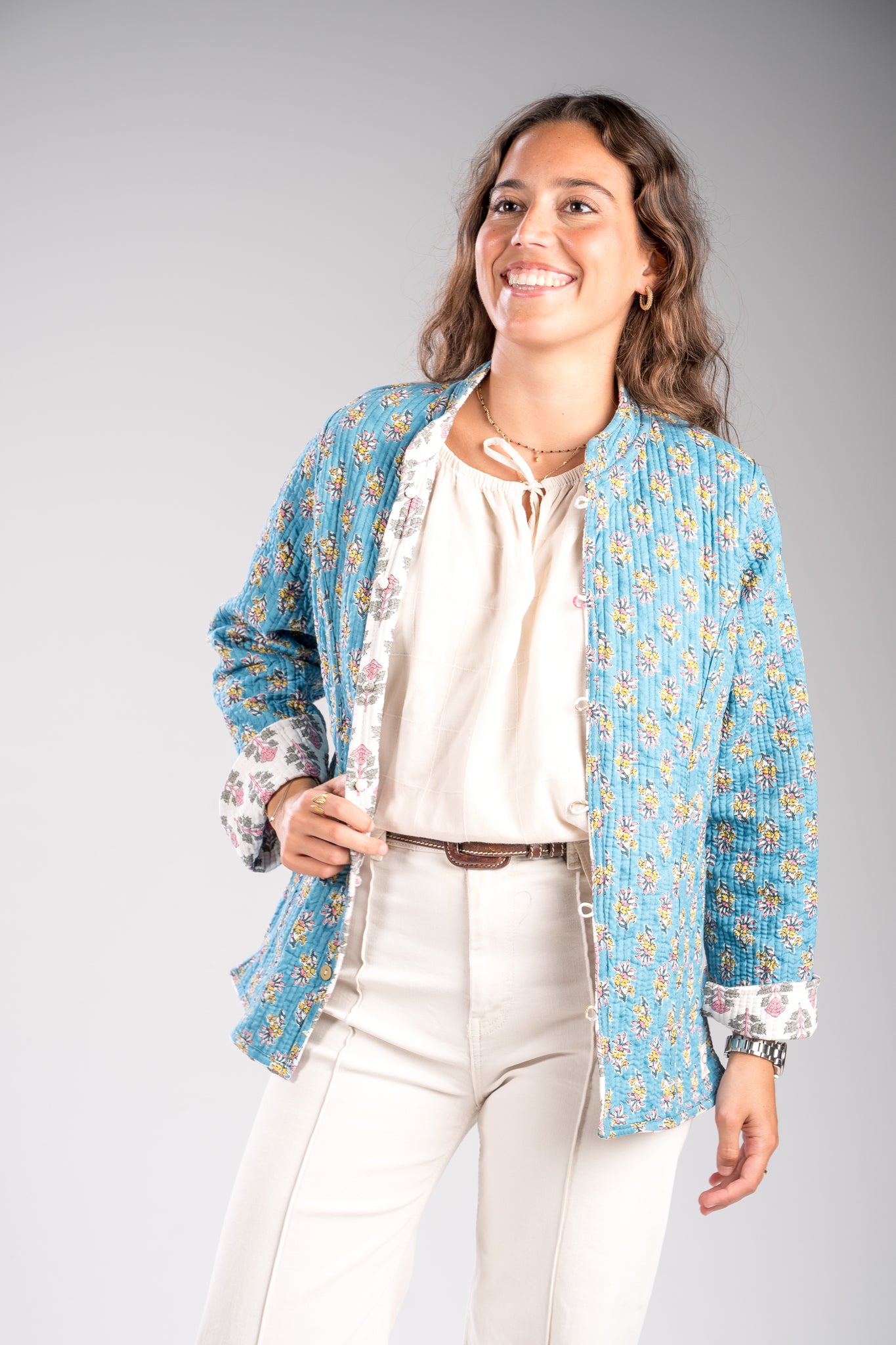 Chaqueta reversible blanca-turquesa