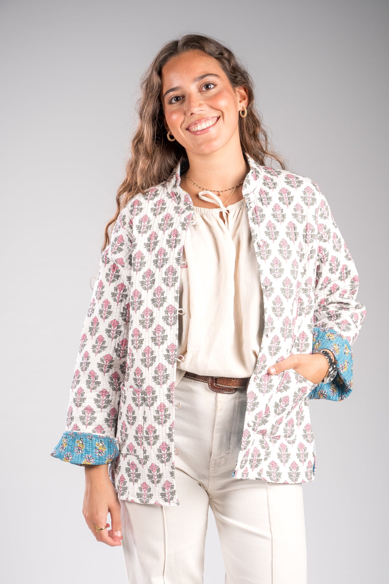 Chaqueta reversible blanca-turquesa