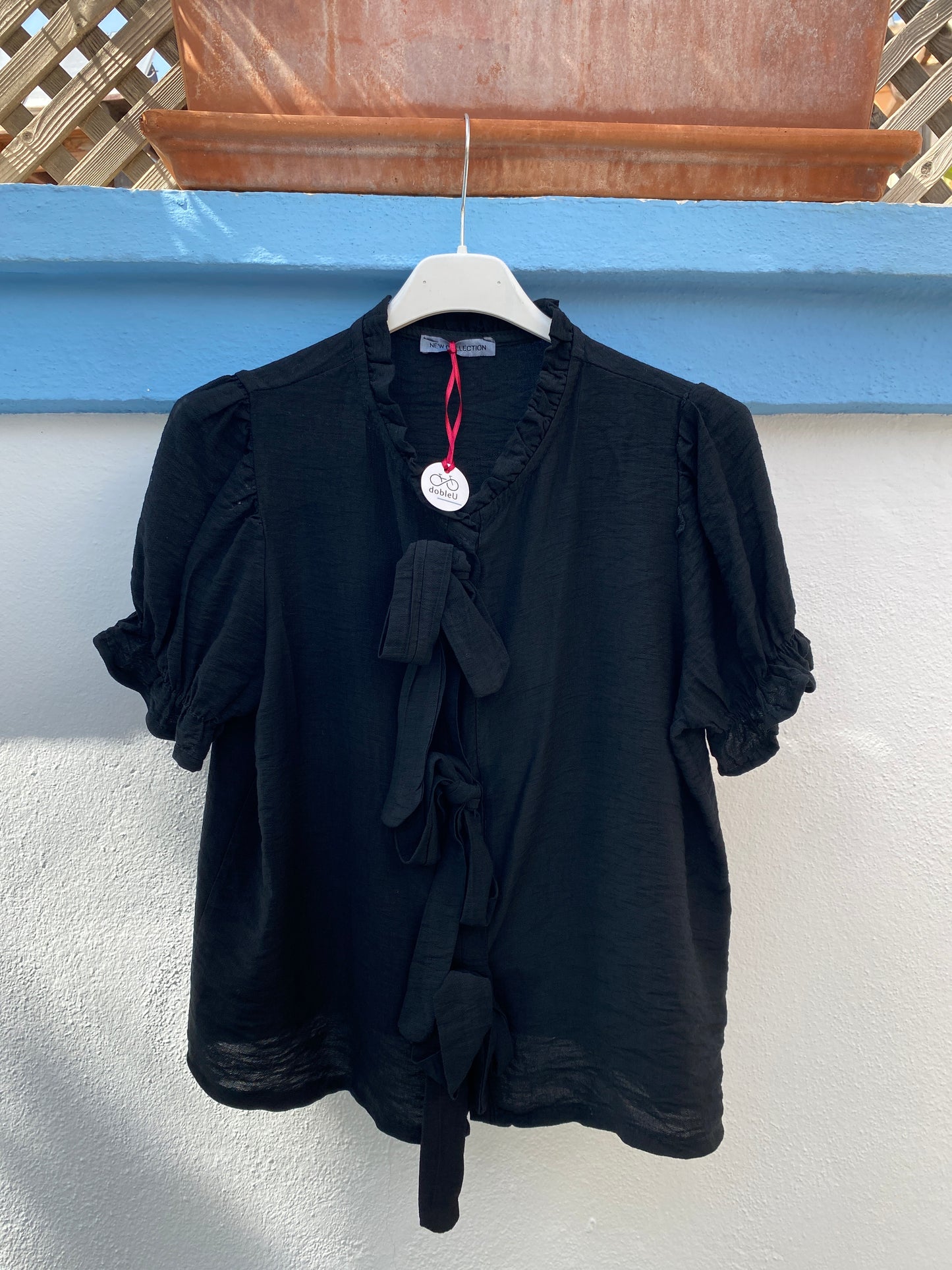 Blusa lazado