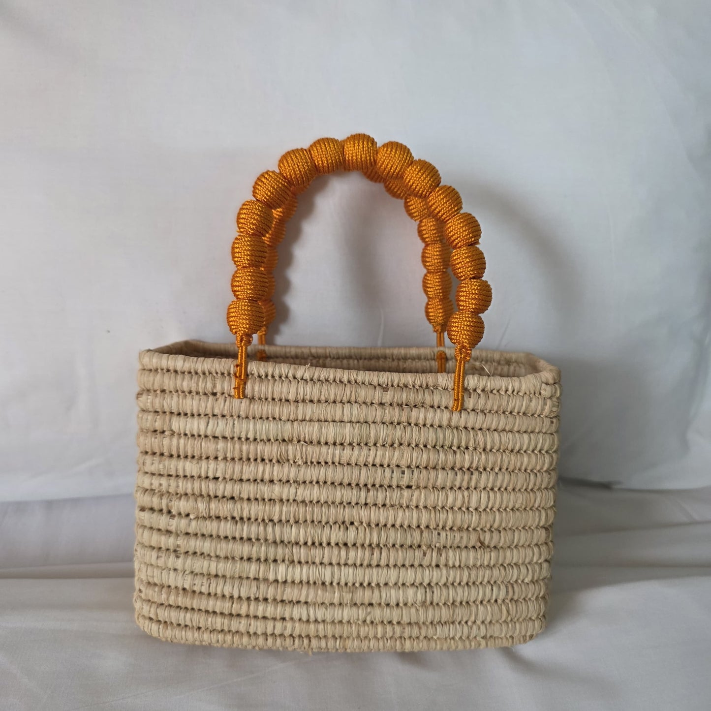 Bolso artesanal de rafia y algodón lúa