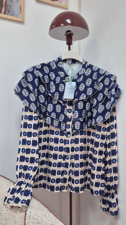 Blusa dos estampados Aura