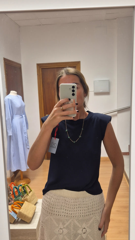 Top de punto con hombreras azul